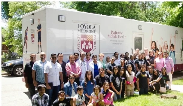 Bethel church family with Loyola Medicine Pediatric Mobile Health outreach van