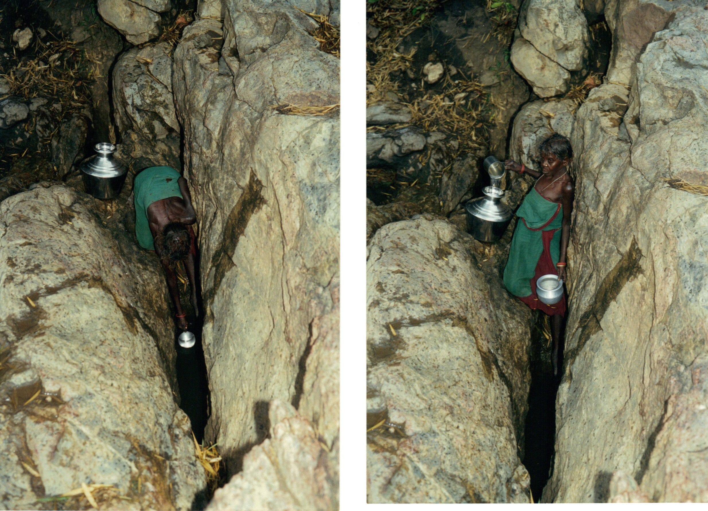 Tribal woman getting water from rock cleft - the village's only water source before the well was constructed